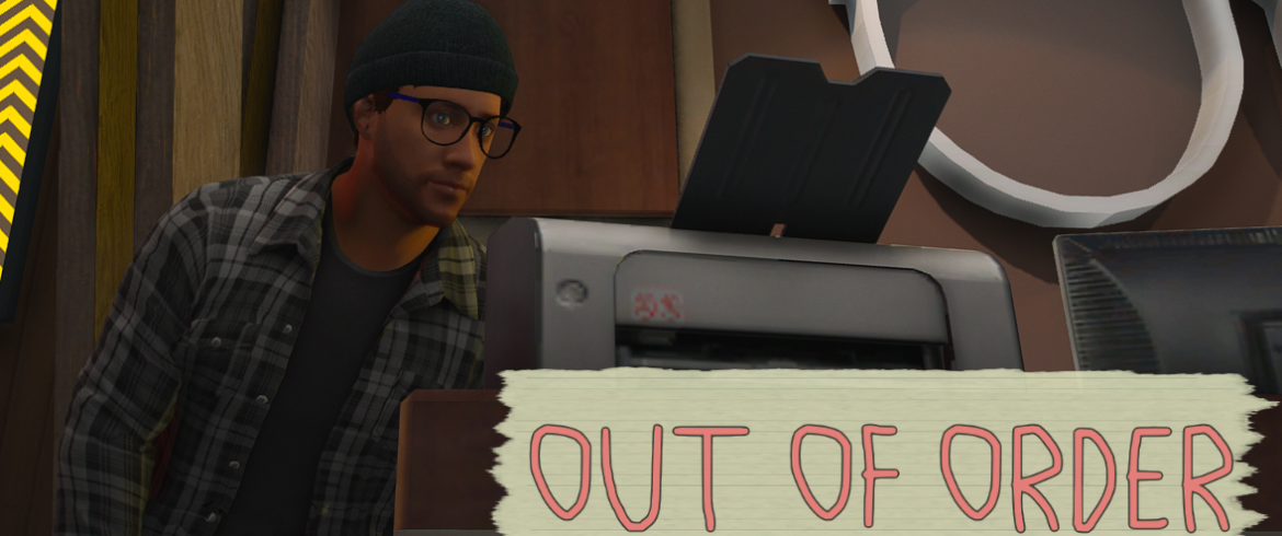 Jason Tucker working on a printer at McKenzie Enterprizes